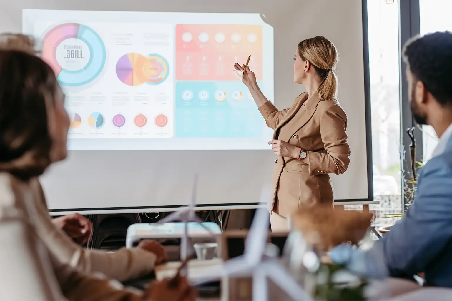 A woman gives a business presentation.