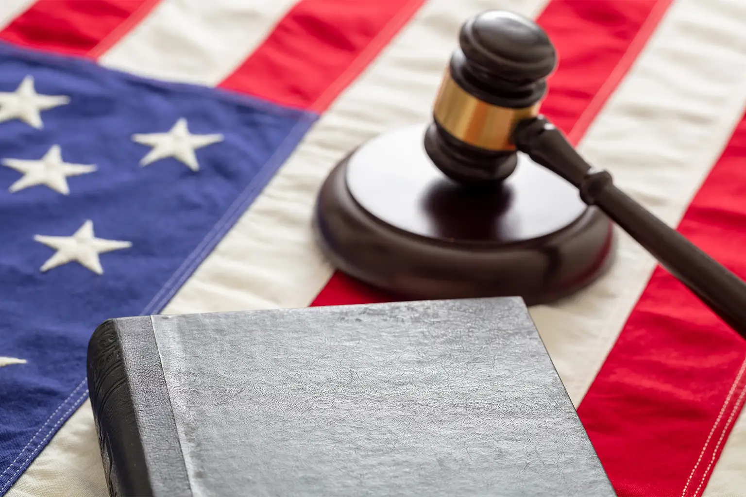 A gavel and American flag.